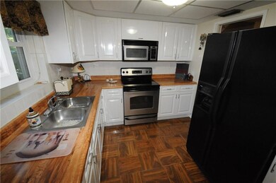 Upgraded kitchen with new solid wood cabinetry.