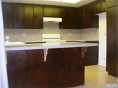 Abundant cabinets restained. Granite counters and 