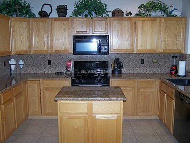 Kitchen. Plenty of cabinets and counter space. Ful