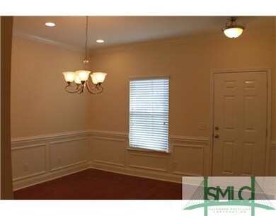 Dining Room. Wood Floors, Specialty Mouldings, Rec