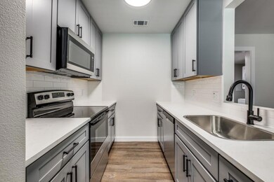 Kitchen featuring light hardwood / wood-style floo