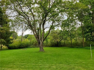 This home is situated on a level .67 acre.