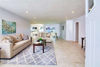 Enter into this bright new living room!