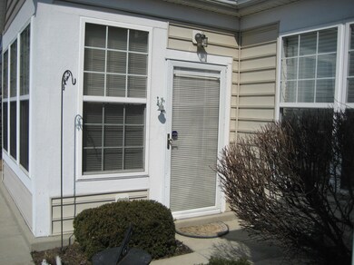 Door to outside from screened porch