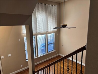 The living room from the second floor. Staircase h
