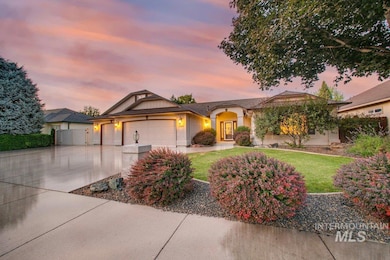 Ranch-style home with concrete driveway, an attached garage, a front yard, and stucco siding