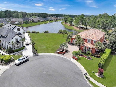 Bird's eye view with a water view and a residentia