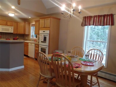 Dining area has plenty of room for a...