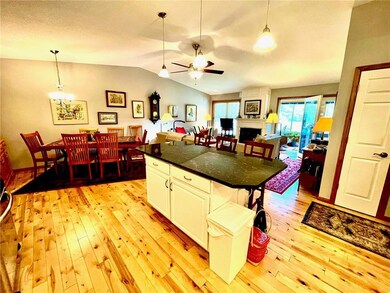 Beautiful hardwood floors throughout the KT/DR/LR area! KT updated with granite countertops, excellent lighting and stainless appliances!