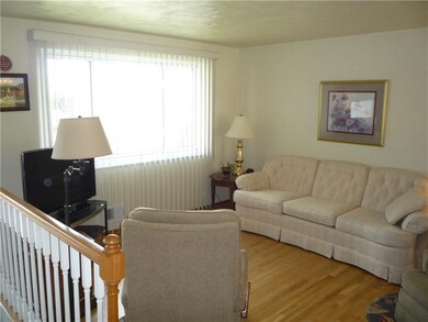 living room has beautiful hardwood floors