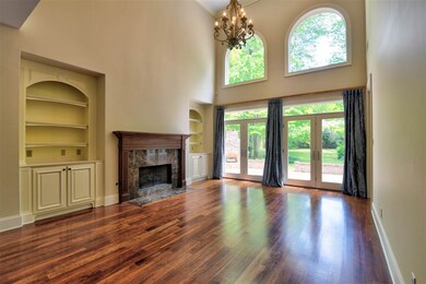 Living Room Overlooks Beautiful Rear Grounds