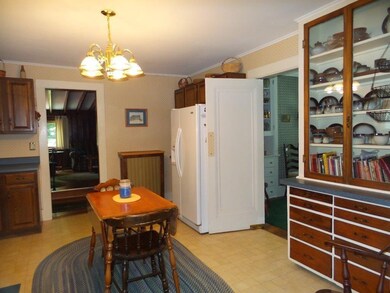 Has swinging door to formal dining