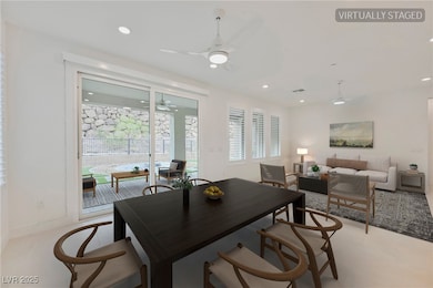 Virtually Staged Dining area with recessed lighting