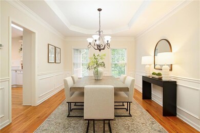 The Dining Room overlooks the tranquil wooded backyard.