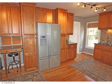 Kitchen - Renovated in 08' with wood floor,custom 
