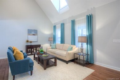 Two-story living area feels bright and spacious