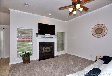 Gas fireplace, clean white baseboards and lots of