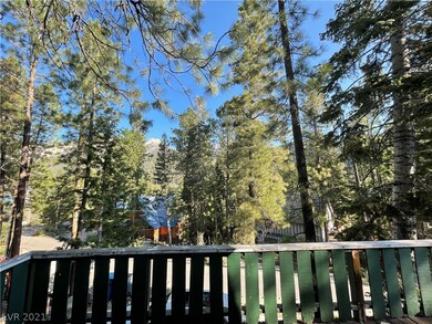North facing balcony overlooks mountain peaks and
