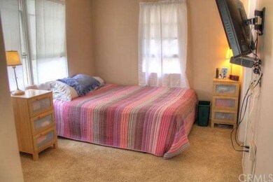 2nd bedroom offers more natural light; open window
