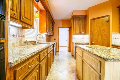 Kitchen looking toward laundry room.
