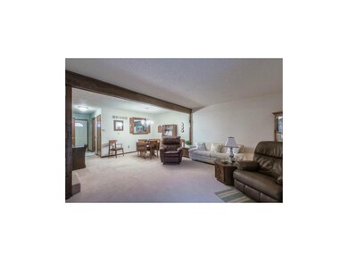 View of Living Room/Dining from Slider to Patio.  