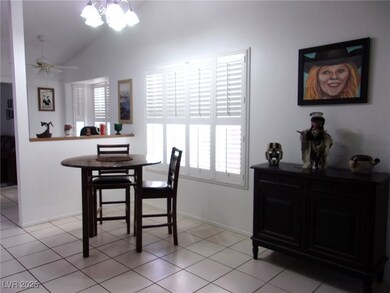Dining room with light tile patterned floors, base