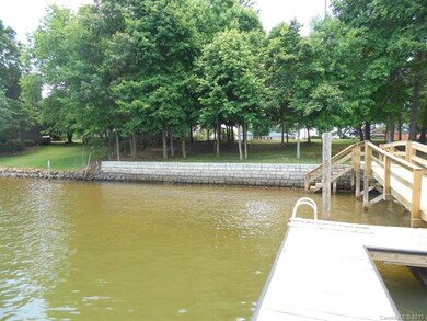 View of seawall from dock.  100ft of waterfront begins with left end of seawall.