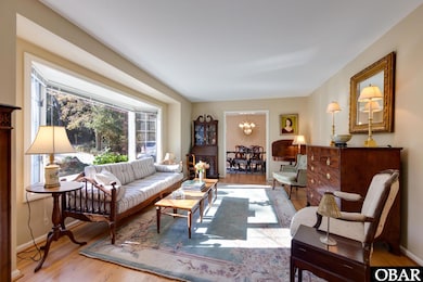 LIVING AREA ADJOINING DINING ROOM