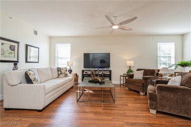 Great room with wood like vinyl flooring
