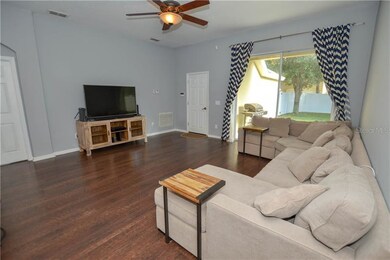 Spacious family room with sliding door to lanai