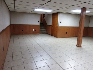 Features of this lower level family room include i