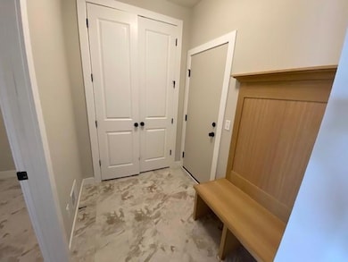 Separate mudroom with large closet; And separate laundry room with door is connected to owner's closet!