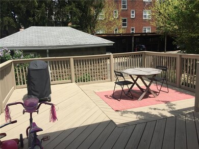 Huge two tiered deck.  Hot tub under lower level.