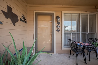 Charming  exterior with a welcoming courtyard.
