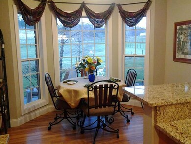 Breakfast nook blends with the High Top Eating Bar, enjoy the serene pasture of your farm animals or nature provided wildlife.