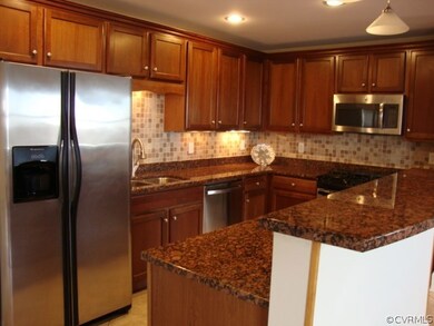 Granite Kitchen with Stainless Appliances