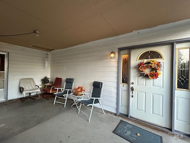 Doorway to property with a patio