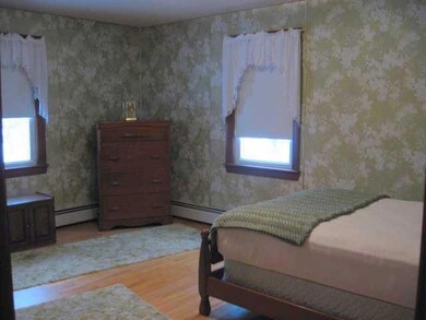 Bedroom. One of two bedrooms - wood...