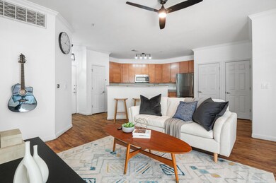 Living area featuring light wood finished floors,