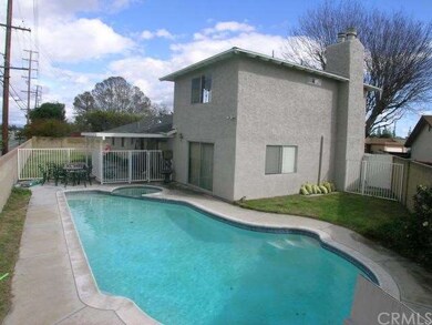 Pool and Spa on one wing of the pie shaped lot