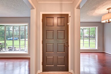 Front door and formal living/dining rooms