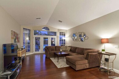 LIVING RM, NEW WOOD FLOOR, WINDOWS, DOOR
