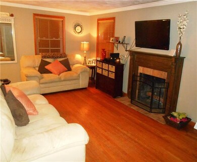 Large Living room with original hardwood floors.