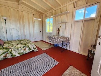 Back door leads to outdoor shower and toilet