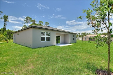 BACK OF HOME... SCREENED LANAI NOT PICTURED