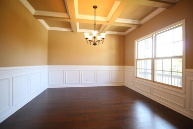 EXAMPLE>>>Formal Dining Room with Lots of Custom Trim and Coffered Ceiling!