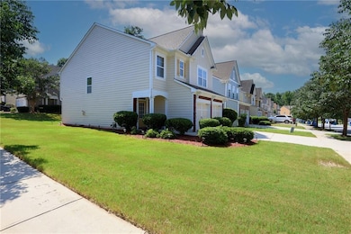 View of home's exterior featuring a residential view, a yard, and board and batten siding