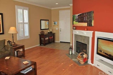 Tile entry with crown molding and recessed lightin