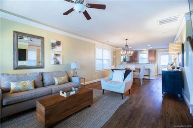 Gorgeous hardwoods, crown molding, upgraded lighti
