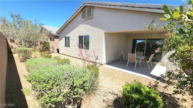 Rear view of property featuring stucco siding, a p